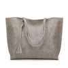 Modische Damen Tasche mit Quasten